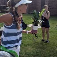 Dr. Kautz moves items into a residence hall